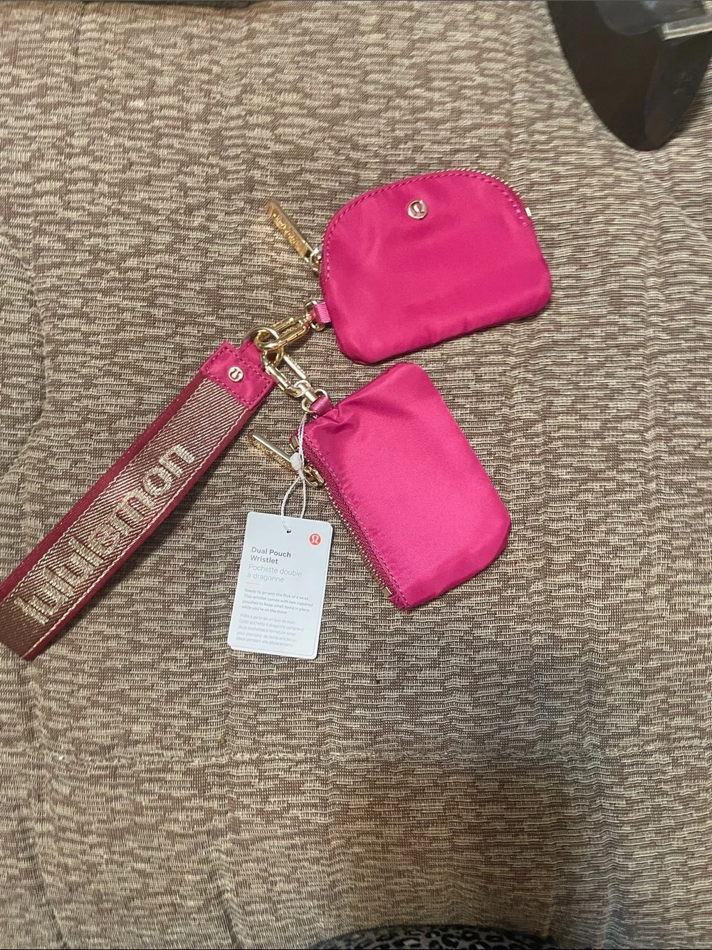 lululemon athletica pink dual pouch wristlet with logo strap